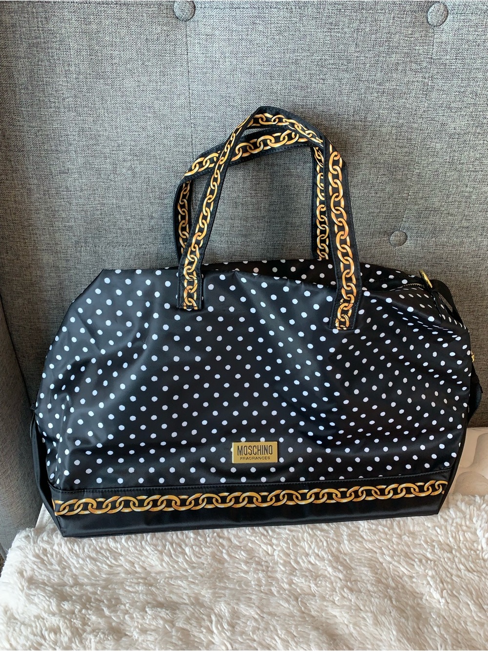 New. MOSCHINO Fragance. Black Polka Dot Travel Bag with Gold Chain Trim